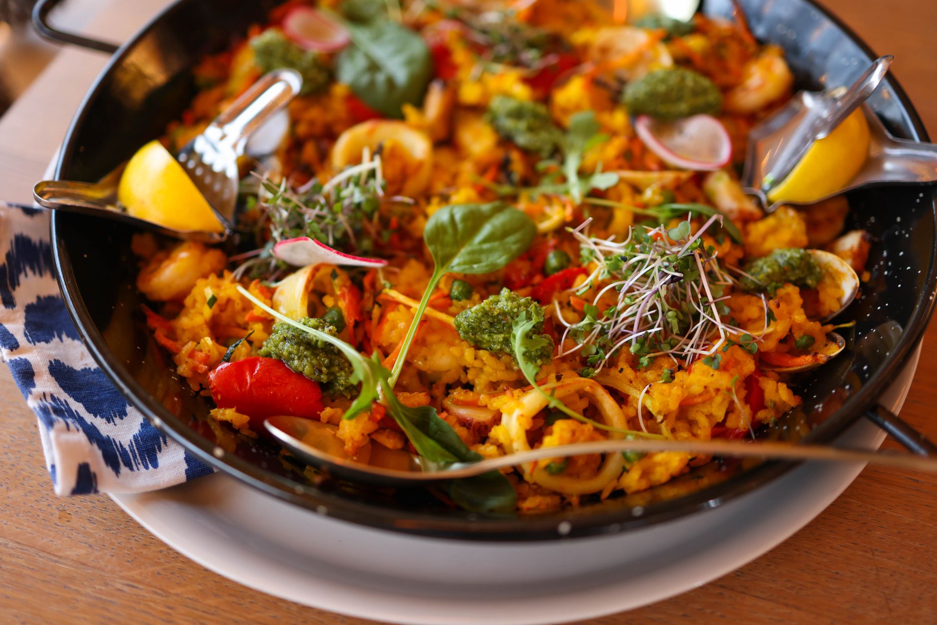 close-up of traditional spanish dishes plated with care abuela's recipe family heirloom cooking timeless flavors fresh local ingredients