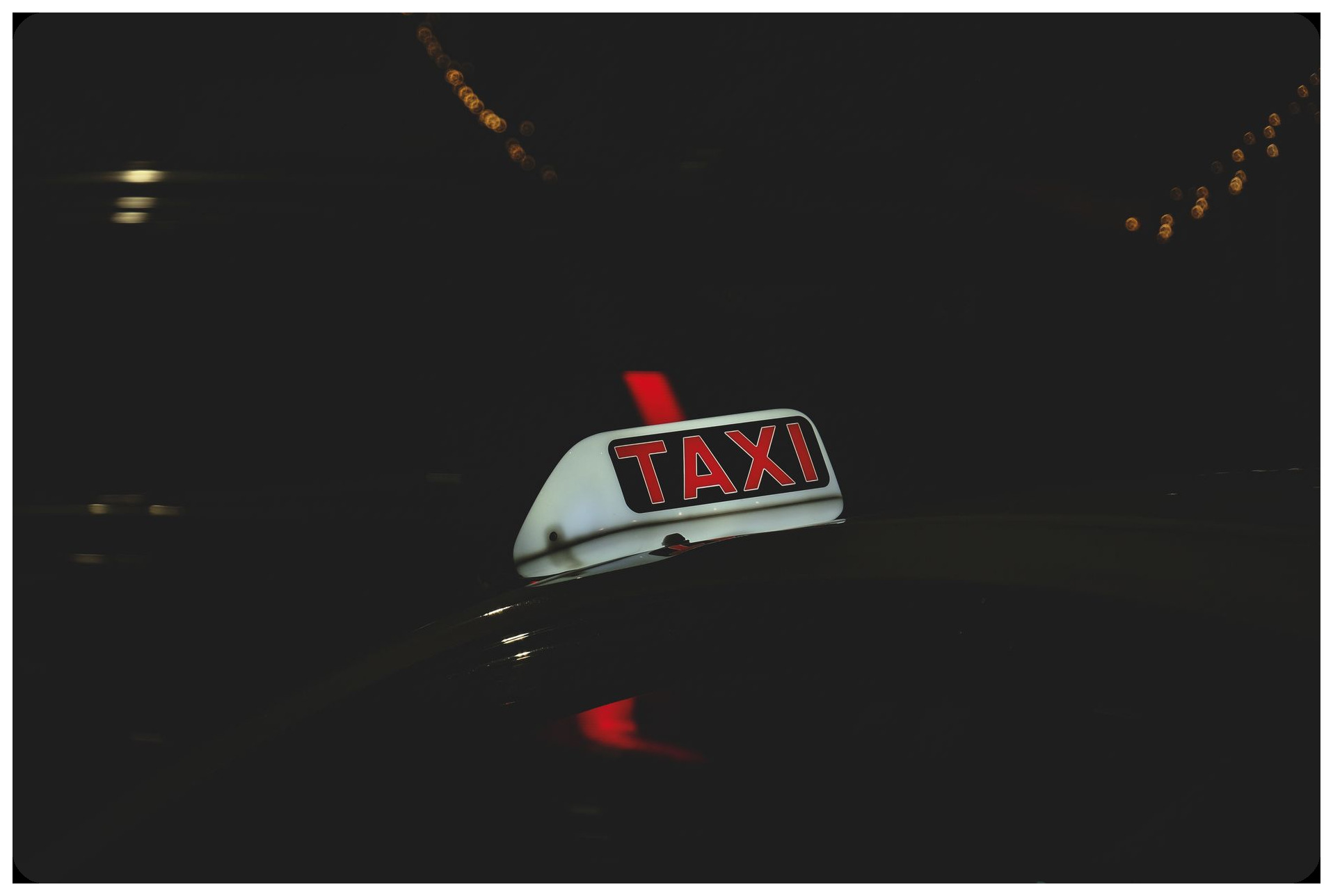vintage taxi cab from 1970s stopped on dark highway at night, red car brake lights, mysterious empty backseat visible