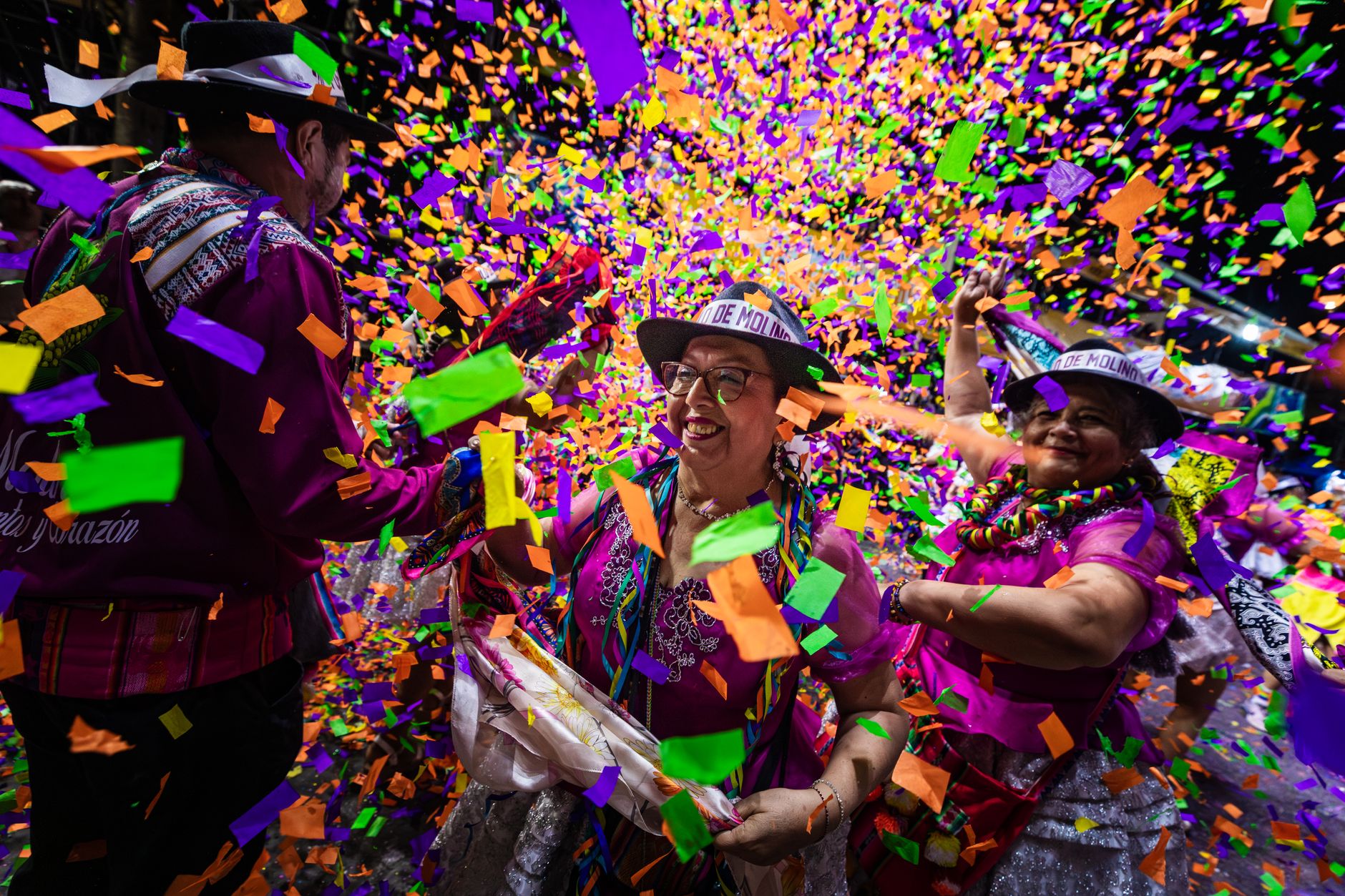 giant basil plants parade through spanish village street confetti festival